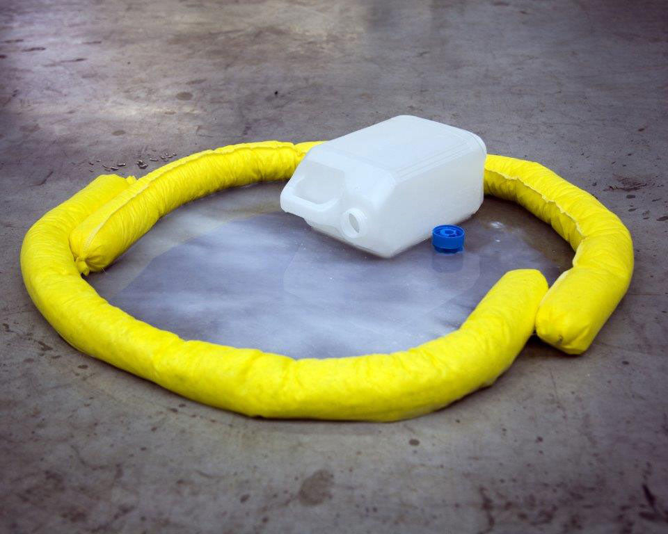 Chemical Absorbent Socks containing a chemical spill