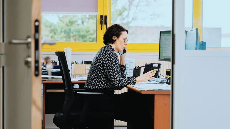 Person answering a call in Delahaye Customer Service